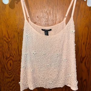 Pink top with beaded detailing